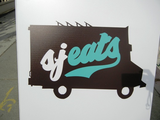 SJ Eats sign.