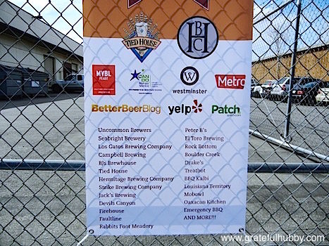 Banner of participating sponsors, brewing companies, and food trucks