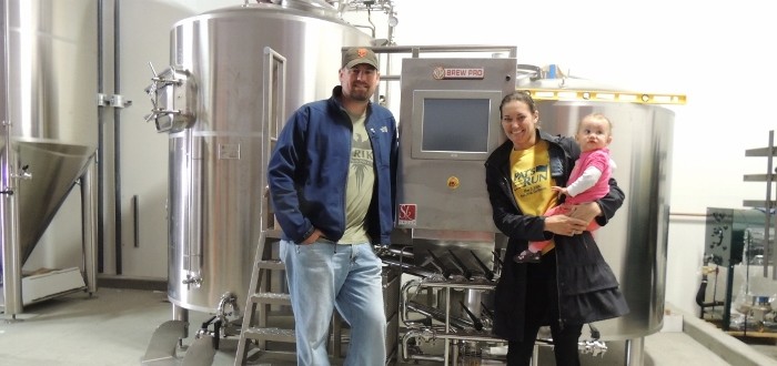 Drew Ehrlich and Jenny Lewis in front of their new brewhouse